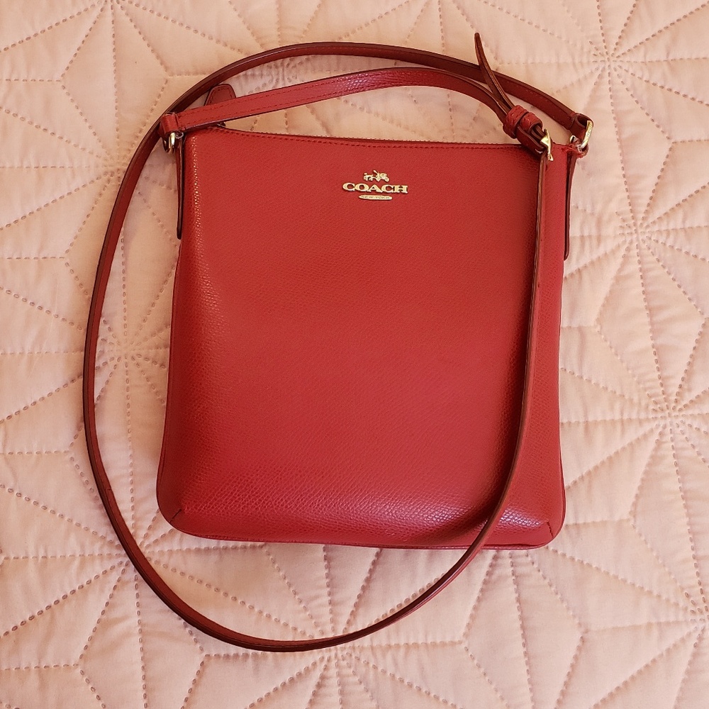 used red leather Coach purse